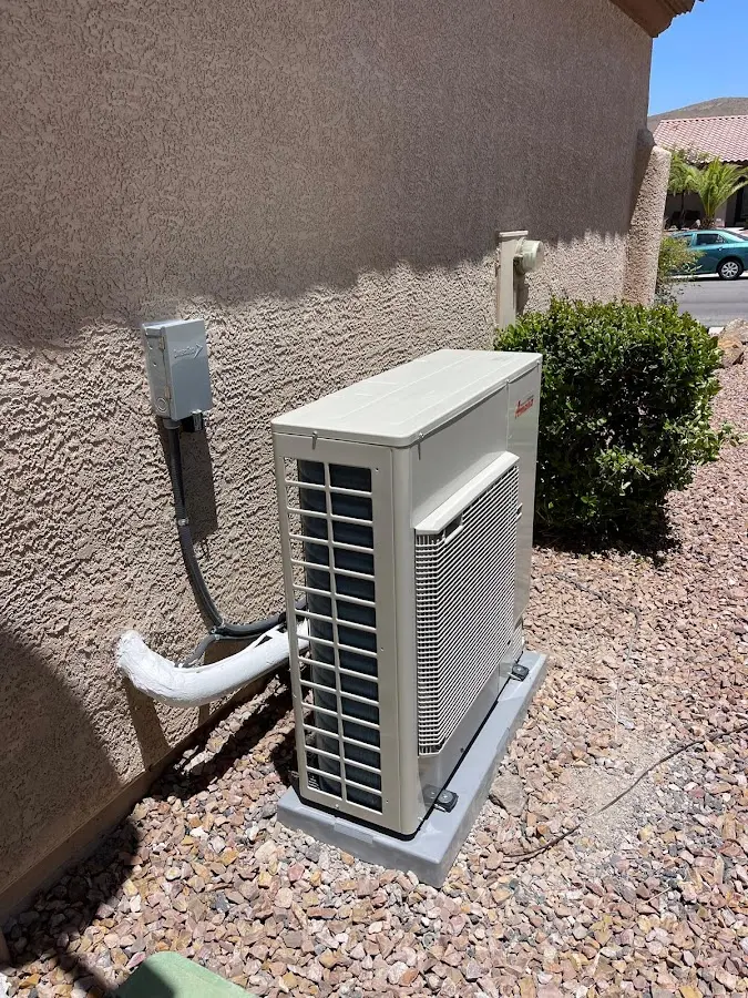 Residential air conditioning condenser unit in Bernards